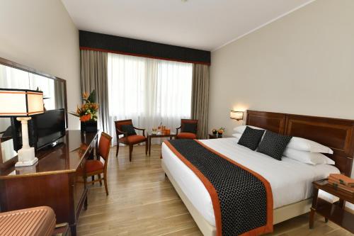 Habitación Doble Clásica - 1 o 2 camas del hotel Bettoja Mediterraneo. Foto 3