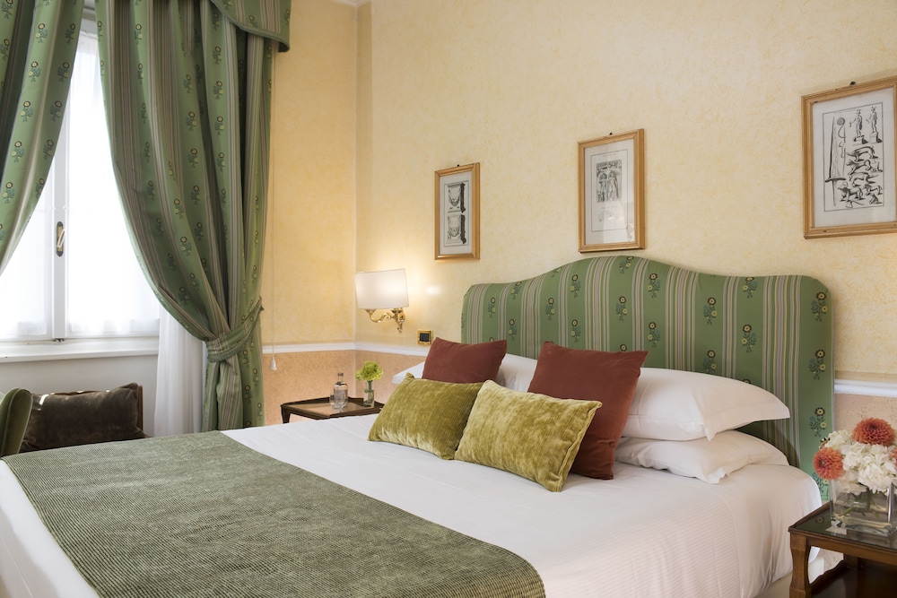 Habitación clásica con 1 cama doble o 2 individuales del hotel Bettoja Massimo D'azeglio. Foto 3