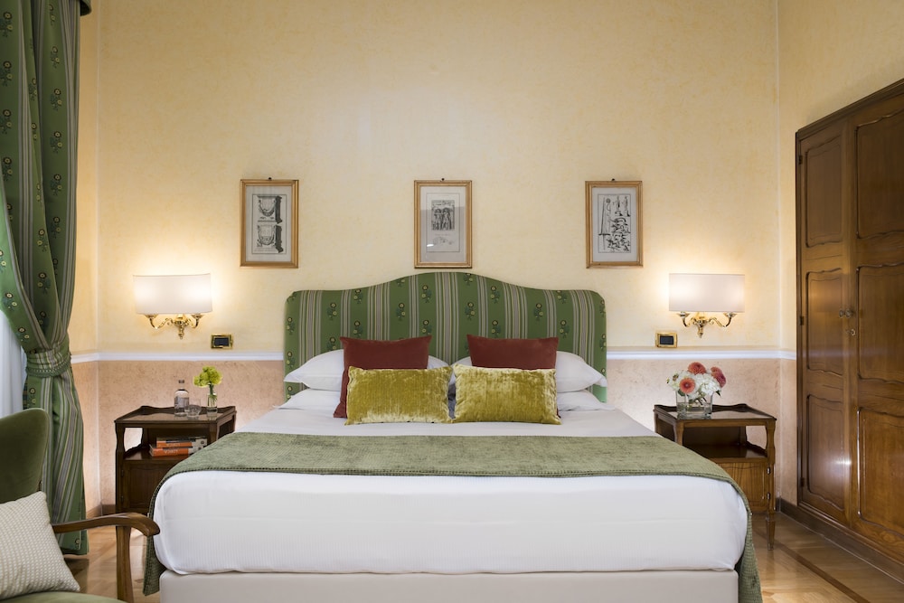 Habitación clásica con 1 cama doble o 2 individuales del hotel Bettoja Massimo D'azeglio. Foto 4