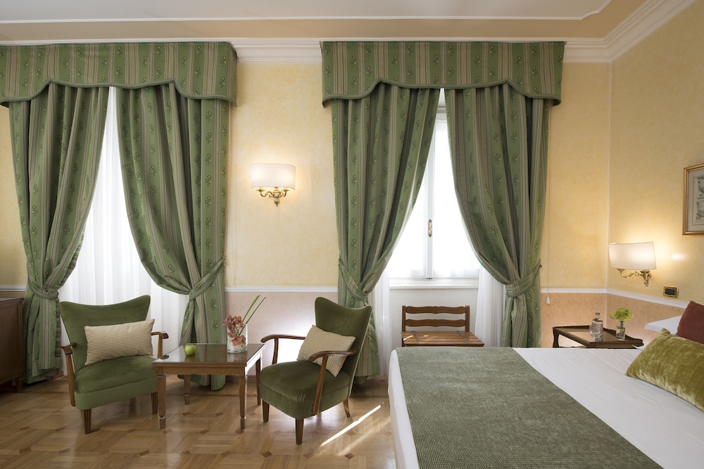 Habitación clásica con 1 cama doble o 2 individuales del hotel Bettoja Massimo D'azeglio. Foto 5