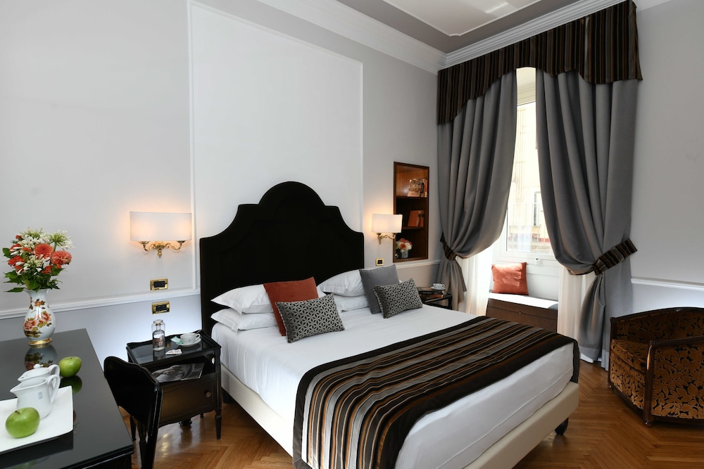 Habitación Premium con 1 cama doble o 2 individuales del hotel Bettoja Massimo D'azeglio. Foto 1
