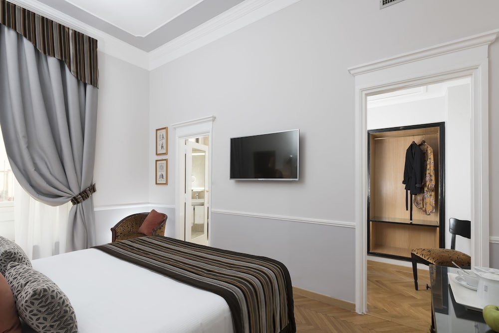 Habitación Premium con 1 cama doble o 2 individuales del hotel Bettoja Massimo D'azeglio. Foto 10