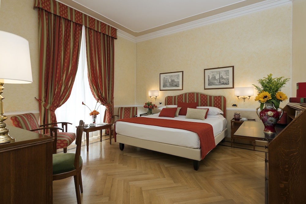 Habitación superior con 1 cama doble o 2 individuales del hotel Bettoja Massimo D'azeglio. Foto 2
