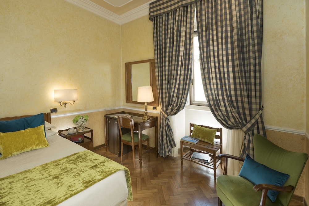 Habitación individual del hotel Bettoja Massimo D'azeglio. Foto 2