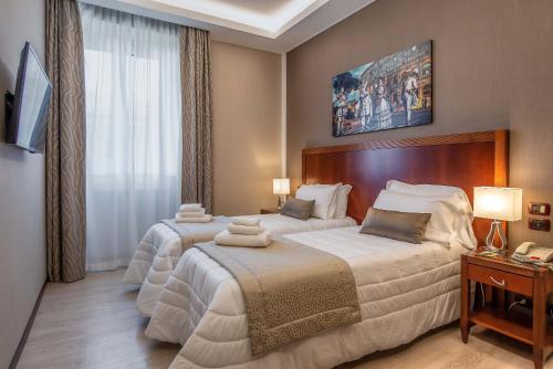 Habitación Doble Estándar del hotel Genova. Foto 2