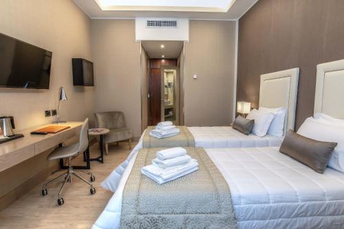 Habitación Doble Deluxe - 1 o 2 camas del hotel Genova. Foto 6