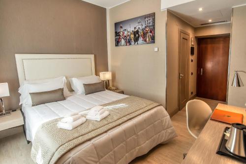 Habitación Deluxe del hotel Genova. Foto 3