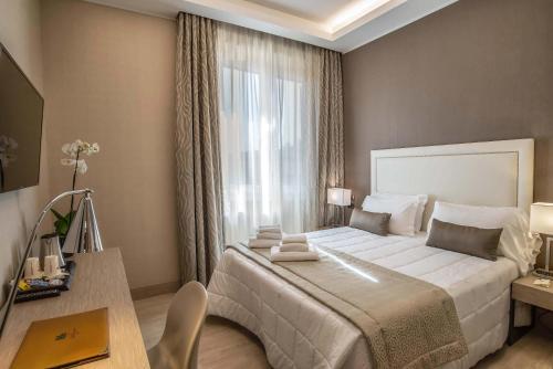 Habitación Deluxe del hotel Genova. Foto 5