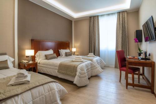 Habitación Triple del hotel Genova. Foto 1
