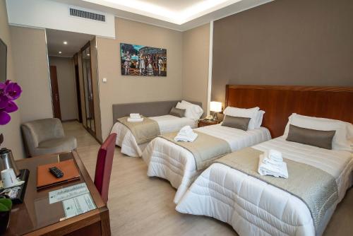 Habitación Triple del hotel Genova. Foto 2