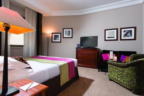 Habitación Doble Deluxe del hotel Dei Mellini. Foto 1