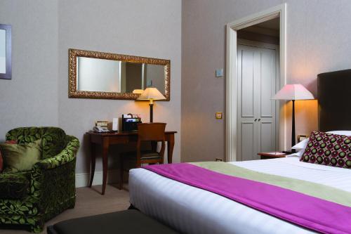 Habitación Doble Deluxe del hotel Dei Mellini. Foto 2