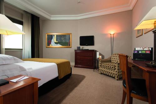 Habitación Doble Deluxe del hotel Dei Mellini. Foto 3
