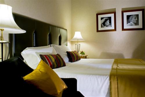 Habitación Triple del hotel Dei Mellini. Foto 3