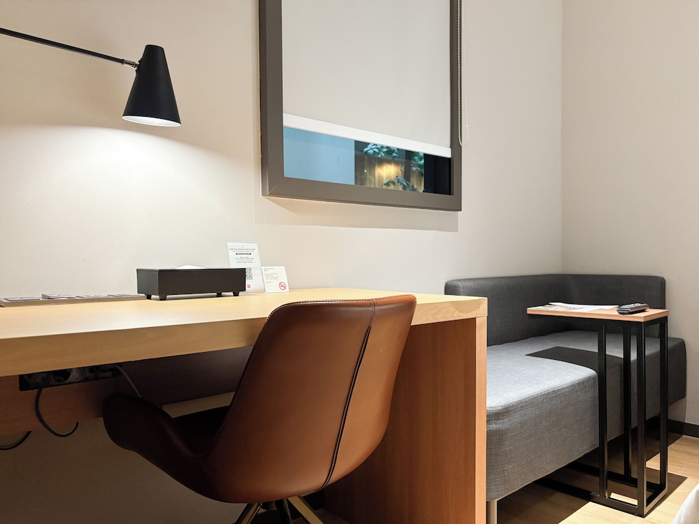 Habitación estándar con 2 camas individuales del hotel Ibis Suwon Ambassador. Foto 4