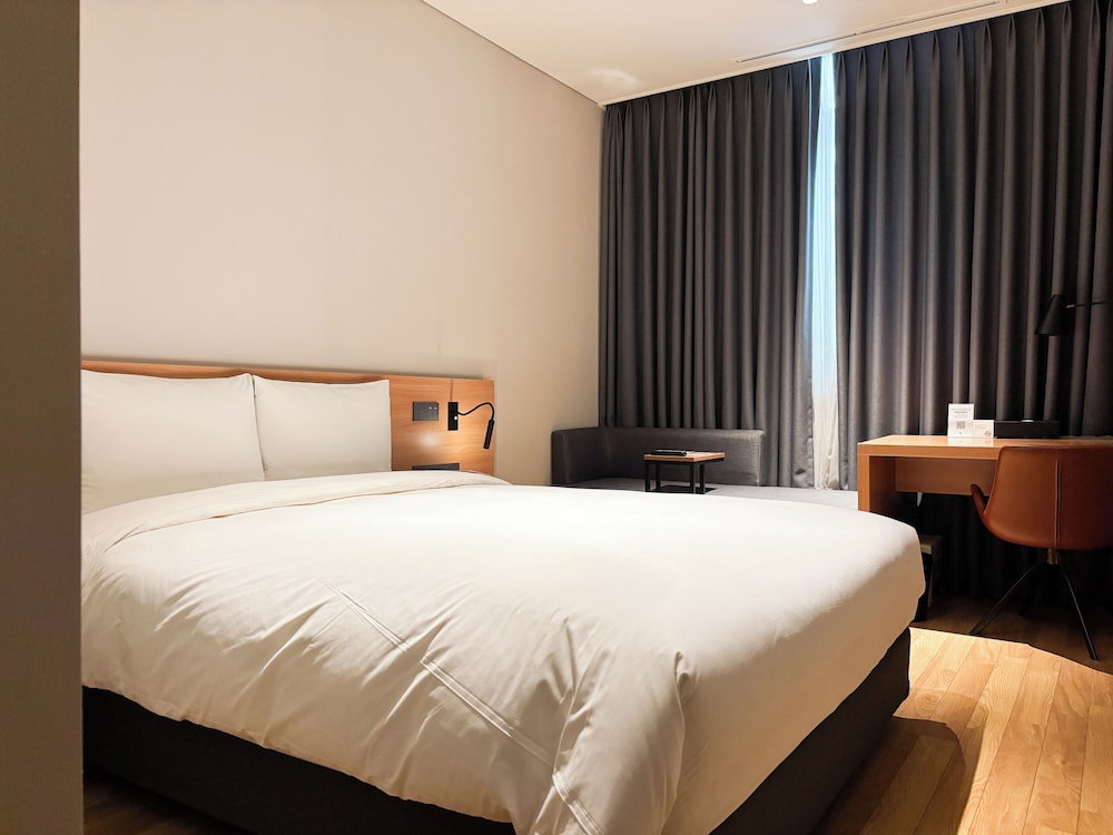 Habitación Superior con 1 cama doble del hotel Ibis Suwon Ambassador. Foto 1