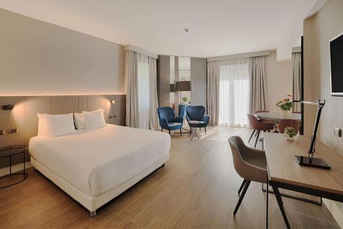 Habitación Superior XL del hotel Nh Roma Villa Carpegna. Foto 2