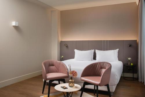 Suite con terraza y cama supletoria del hotel Nh Roma Villa Carpegna