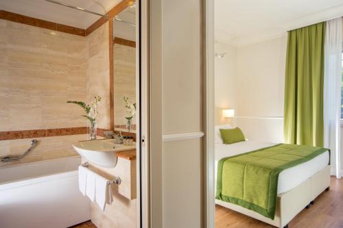 Habitación Triple del hotel Cristoforo Colombo. Foto 1