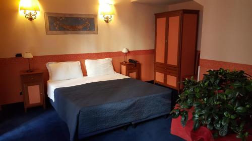 Habitación Triple del hotel Antico Palazzo Rospigliosi