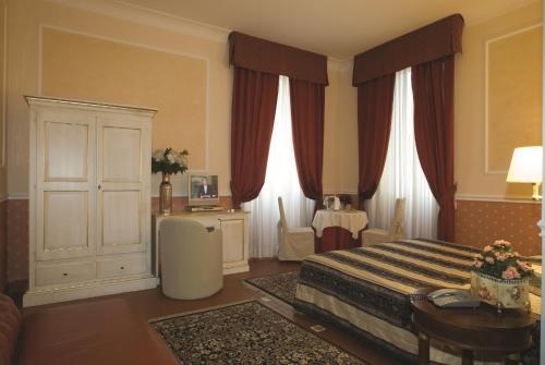 Habitación Triple Superior del hotel Antico Palazzo Rospigliosi. Foto 1