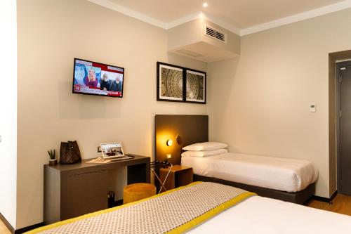 Habitación Triple Deluxe del hotel The Cross. Foto 3