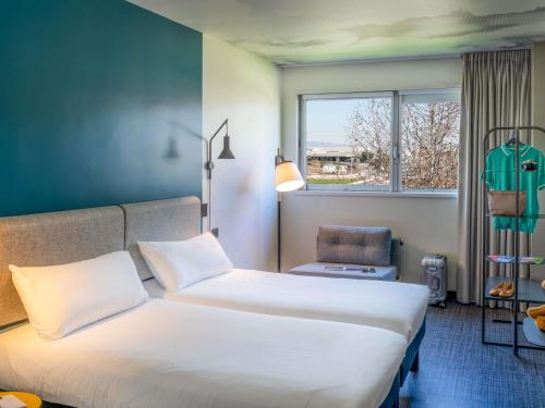 Habitación Doble Superior - 2 camas del hotel ibis Barcelona Aeropuerto Viladecans. Foto 1