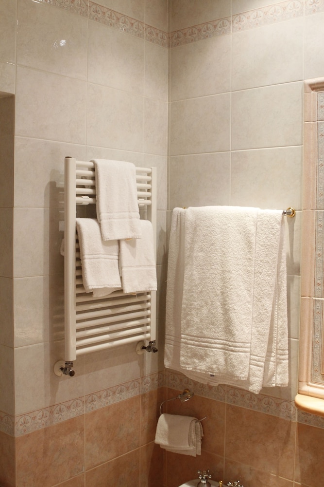 Habitación triple del hotel Pace Helvezia. Foto 3