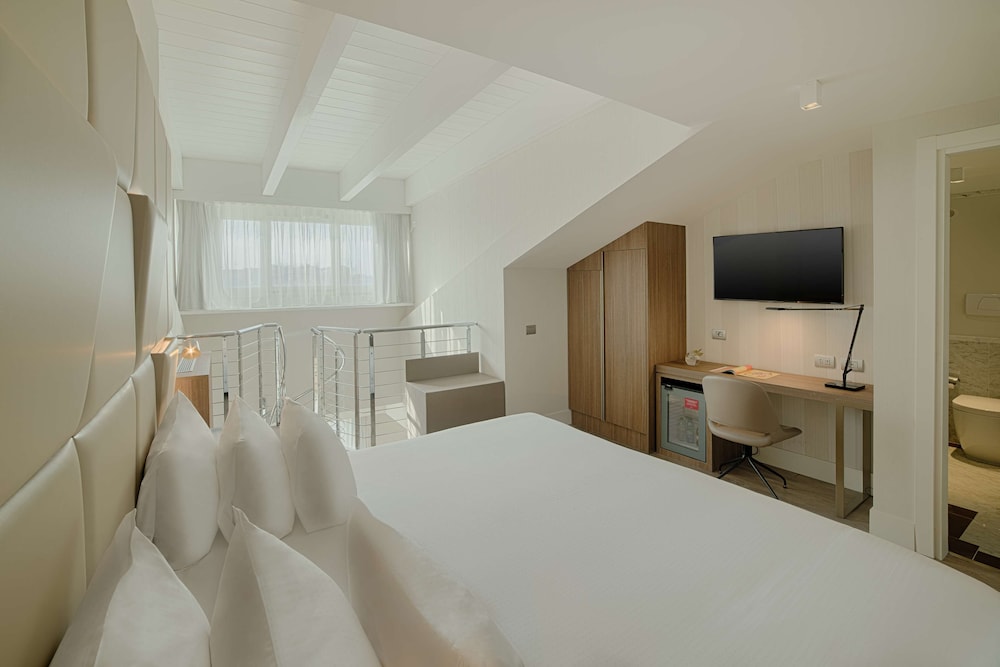Suite (Duplex Extra Bed 3 adults) del hotel Nh Collection Roma Centro. Foto 4