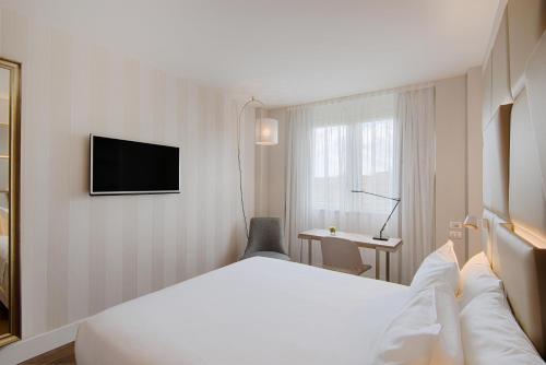 Habitación Doble Premium con cama supletoria - 1 o 2 camas del hotel Nh Collection Roma Centro. Foto 5