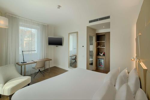 Habitación Doble Premium XL - 2 camas del hotel Nh Collection Roma Centro. Foto 2