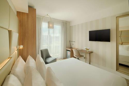 Habitación Individual Superior del hotel Nh Collection Roma Centro. Foto 1
