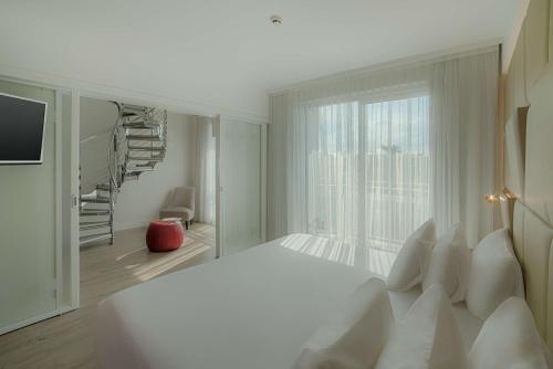 Suite Dúplex con cama supletoria del hotel Nh Collection Roma Centro. Foto 1