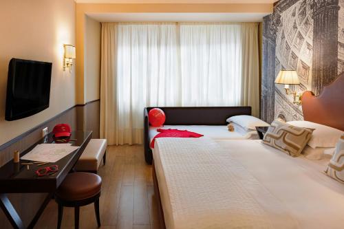 Habitación Familiar del hotel Starhotels Michelangelo. Foto 2