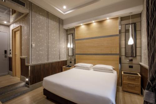 Habitación con cama extragrande. del hotel Morgana. Foto 17