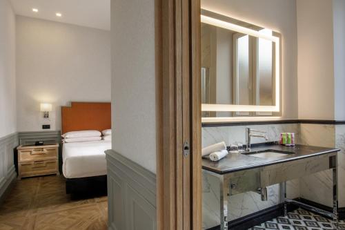 Habitación Triple de lujo del hotel Morgana. Foto 10