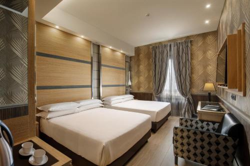 Habitación Cuádruple de Lujo del hotel Morgana. Foto 15