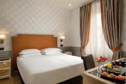 Habitación Cuádruple de Lujo del hotel Morgana. Foto 17
