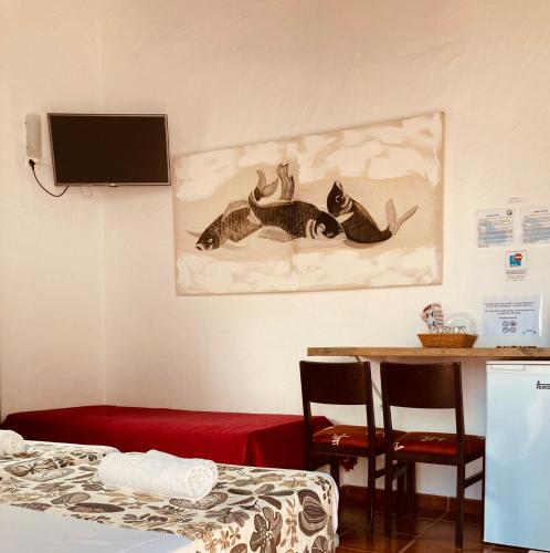 Twin Room with Shower del hotel Villa Marina Apartamentos y Habitaciones. Foto 6