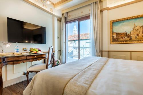 Habitación Doble Executive con terraza del hotel Monaco and Grand Canal. Foto 1