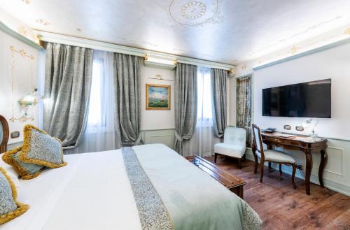Habitación Doble Deluxe del hotel Monaco and Grand Canal. Foto 3