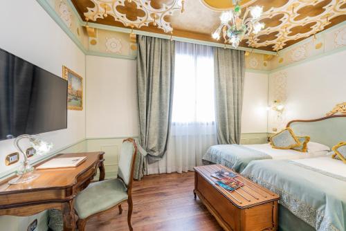 Habitación Doble Deluxe del hotel Monaco and Grand Canal. Foto 16
