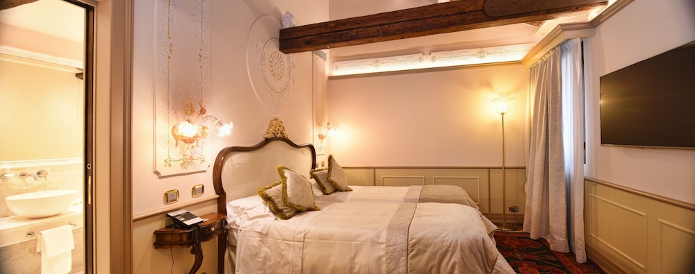 Suite del hotel Monaco and Grand Canal. Foto 1