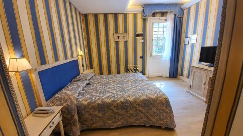 Habitación Doble con patio del hotel Carlton On The Grand Canal. Foto 5