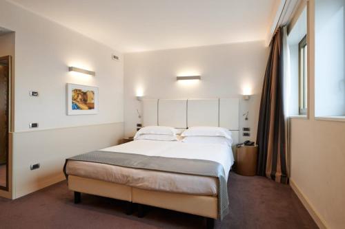 Habitación Doble Deluxe con sofá cama - 1 o 2 camas del hotel Plaza Venice. Foto 3