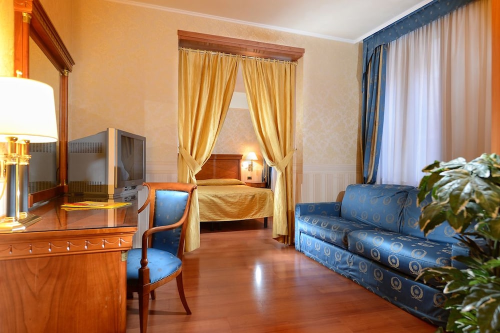 Habitación cuádruple del hotel Antico Panada