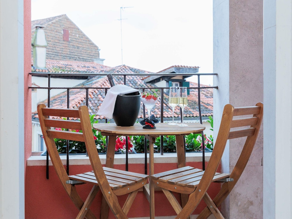 Habitación Triple Deluxe con Vistas al Canal del hotel Hotel Papadopoli Venezia - MGallery Collection. Foto 9