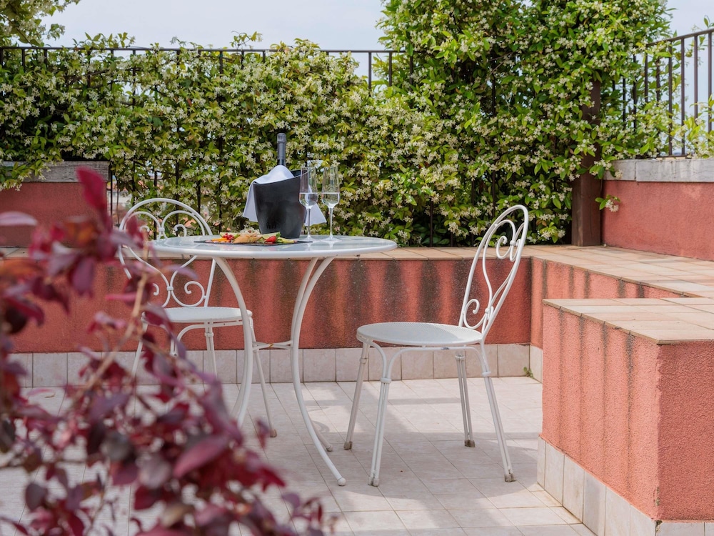 Suite Ejecutiva con terraza privada y vistas a la ciudad del hotel Hotel Papadopoli Venezia - MGallery Collection. Foto 10