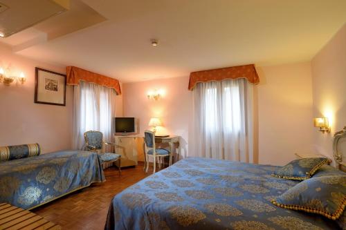 Habitación Triple del hotel Royal San Marco. Foto 4