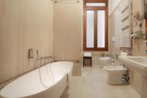 Suite Junior Santomaso del hotel All’angelo Art. Foto 2